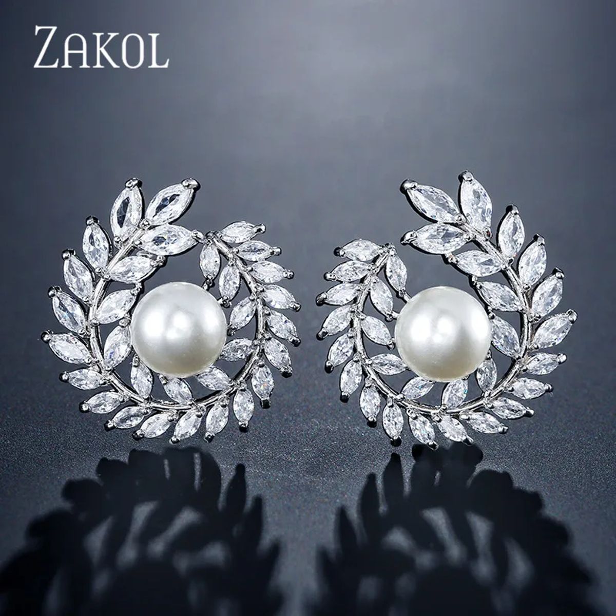 Elegant Simulated Pearl Stud Earrings with Cubic Zirconia Detail Elegant Simulated Pearl Stud Earrings with Cubic Zirconia Detail