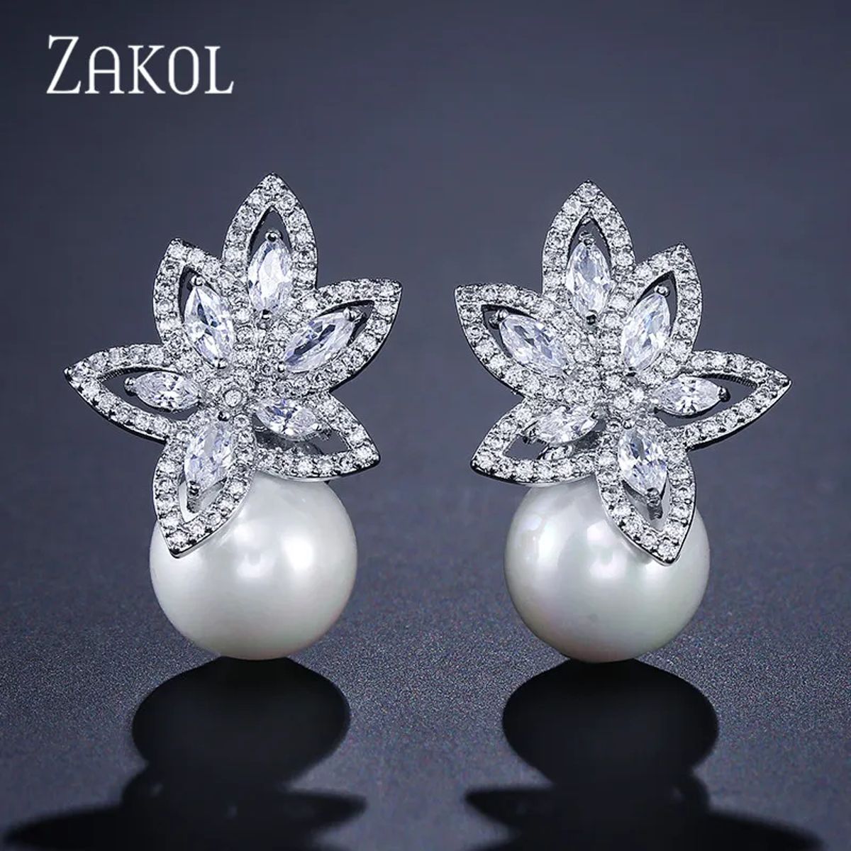Elegant Simulated Pearl Stud Earrings with Cubic Zirconia Detailing Elegant Simulated Pearl Stud Earrings with Cubic Zirconia Detailing