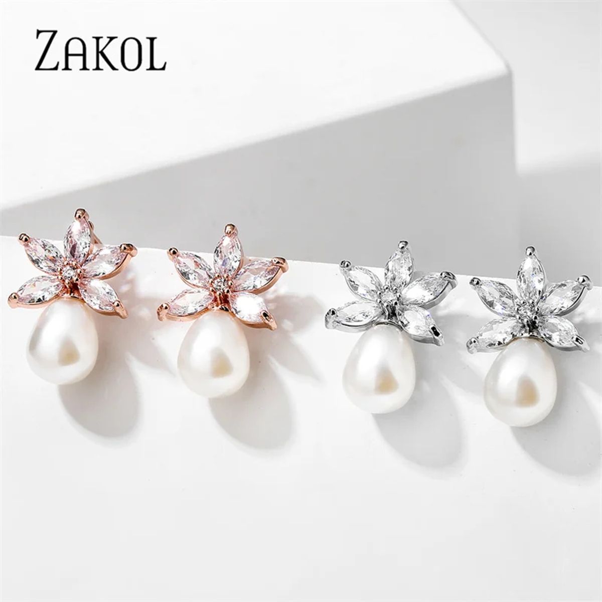 Elegant Leaf-Shaped Cubic Zirconia and Pearl Drop Earrings Elegant Leaf-Shaped Cubic Zirconia and Pearl Drop Earrings