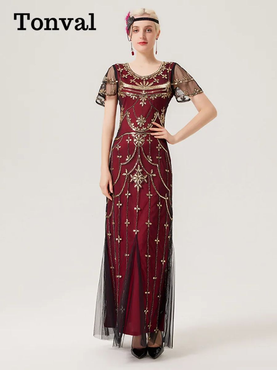 Elegant Vintage Sequin Beaded Gown with Mesh Overlay Elegant Vintage Sequin Beaded Gown with Mesh Overlay