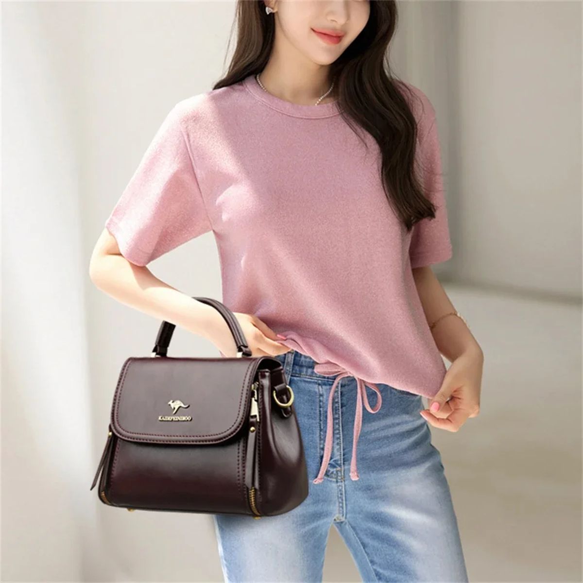 Elegant Soft Leather Handbag with Top Handle and Shoulder Strap Elegant Soft Leather Handbag with Top Handle and Shoulder Strap