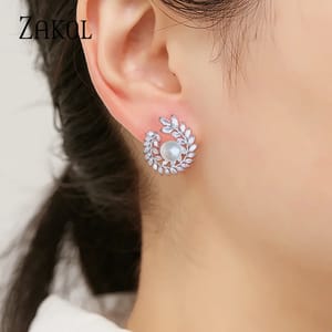 Elegant Simulated Pearl Stud Earrings with Cubic Zirconia Detail Elegant Simulated Pearl Stud Earrings with Cubic Zirconia Detail