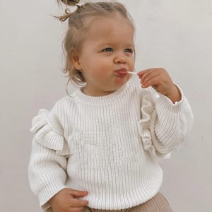 Baby Girls Knit Sweater with Ruffle Sleeves for Cooler Seasons Baby Girls Knit Sweater with Ruffle Sleeves for Cooler Seasons