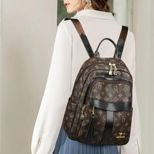 Fashionable PU Leather Backpack with Tassels and Large Capacity
