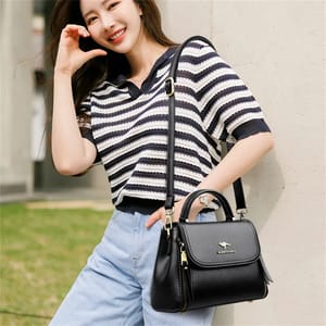 Elegant Soft Leather Handbag with Top Handle and Shoulder Strap Elegant Soft Leather Handbag with Top Handle and Shoulder Strap