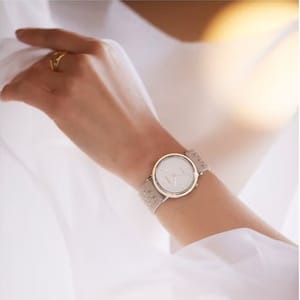 Elegant Citizen Women’s Eco-Drive Analog Watch with Fabric Band Elegant Citizen Women’s Eco-Drive Analog Watch with Fabric Band