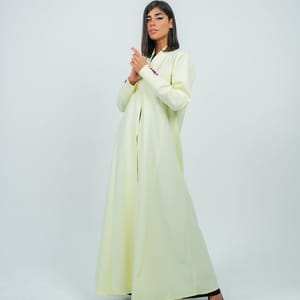 Yellow Abaya Featuring Button Coloring Style
