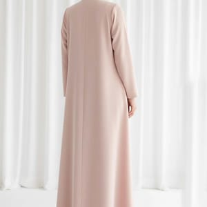 The Sunburst Pink Pleat Abaya