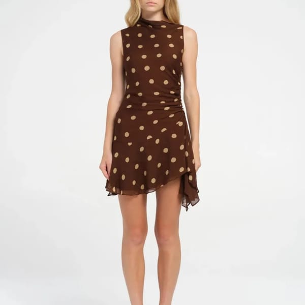 Chic Sleeveless Polka Dot Mini Dress with Ruched Detailing