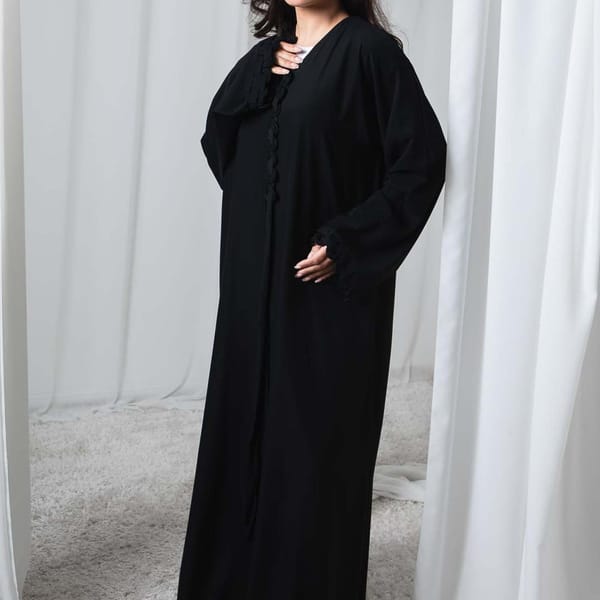 Timeless Black Nida Abaya with Subtle Trim Detail